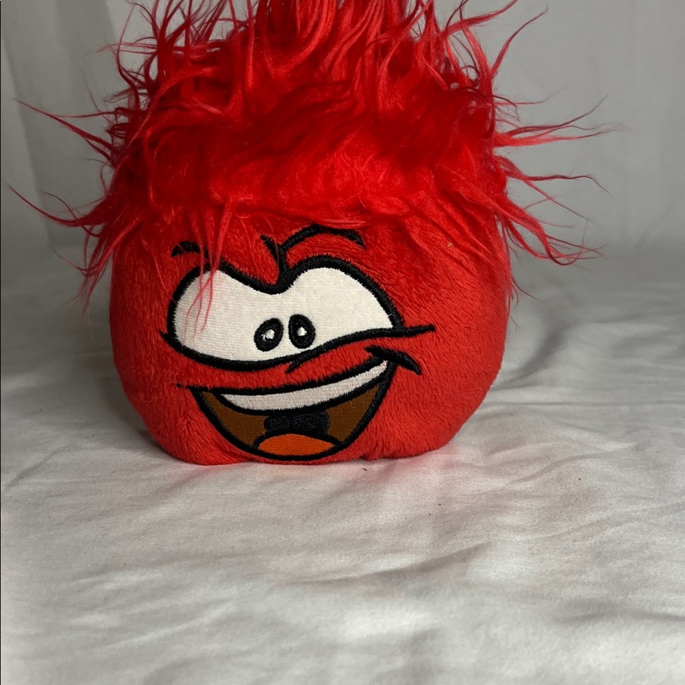 Club Penguin red puffel plush